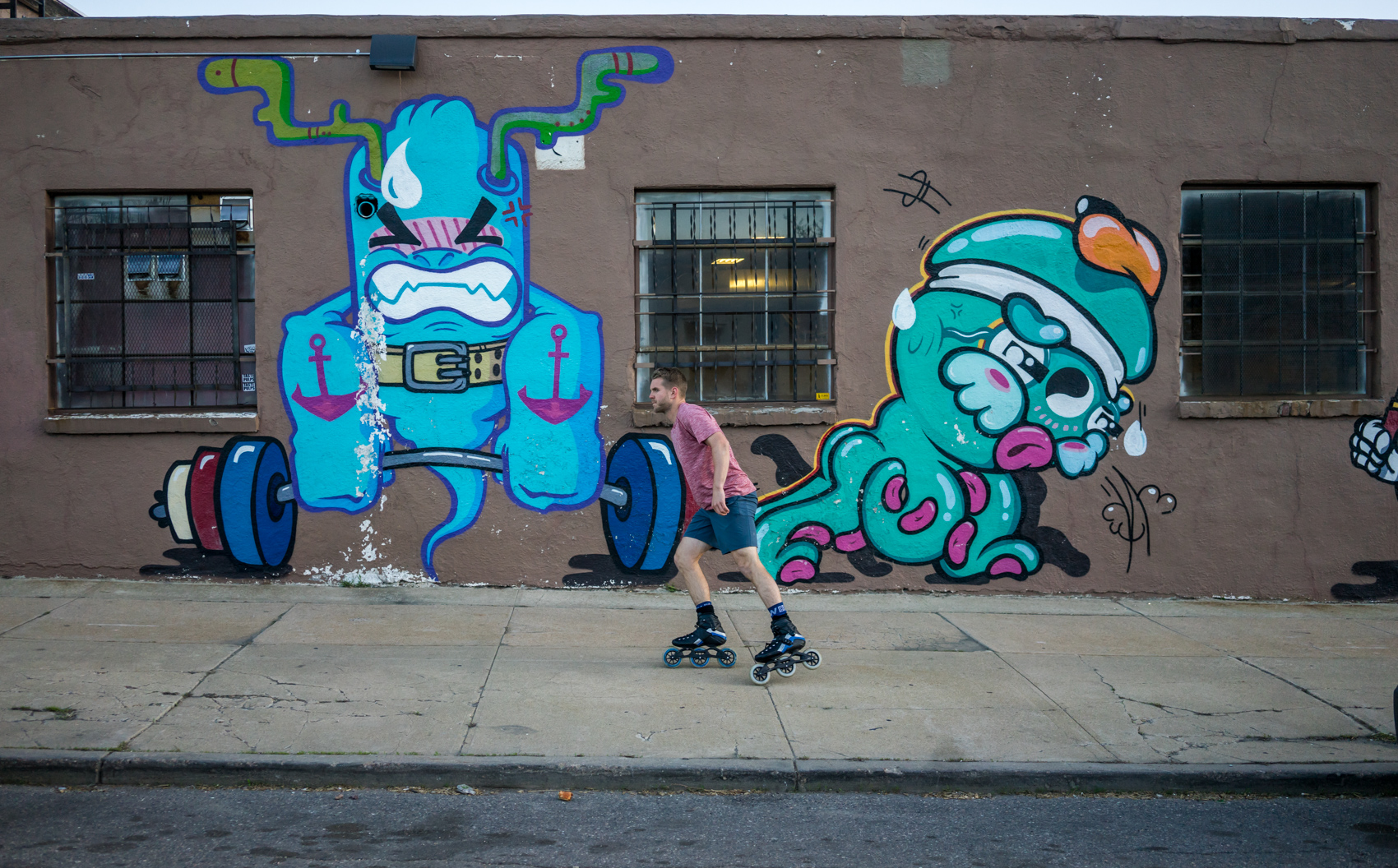 Mike Lempko skating down the sidewalk