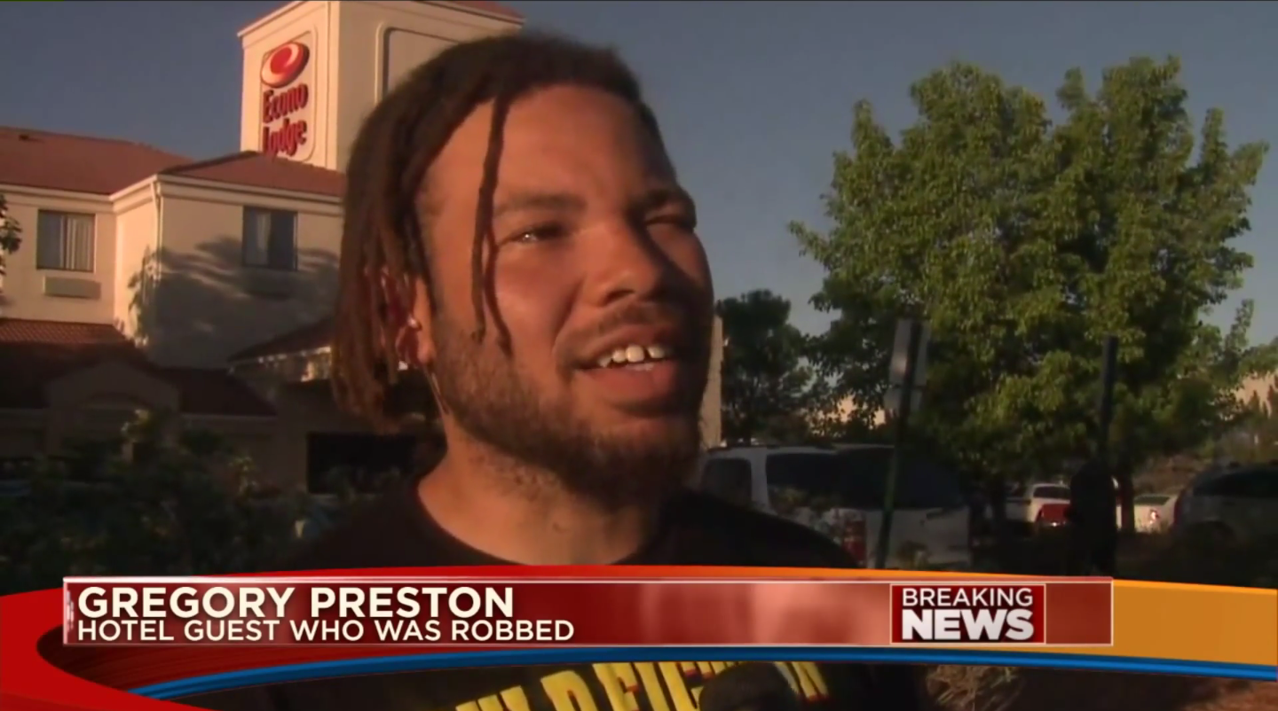 Gregory Preston talking to the news